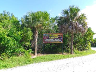 Entrance sign after you get in the driveway